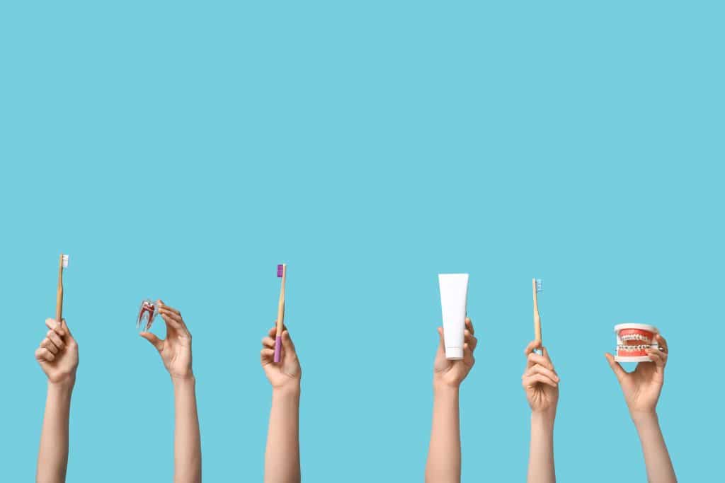 multiple dental objects on blue background